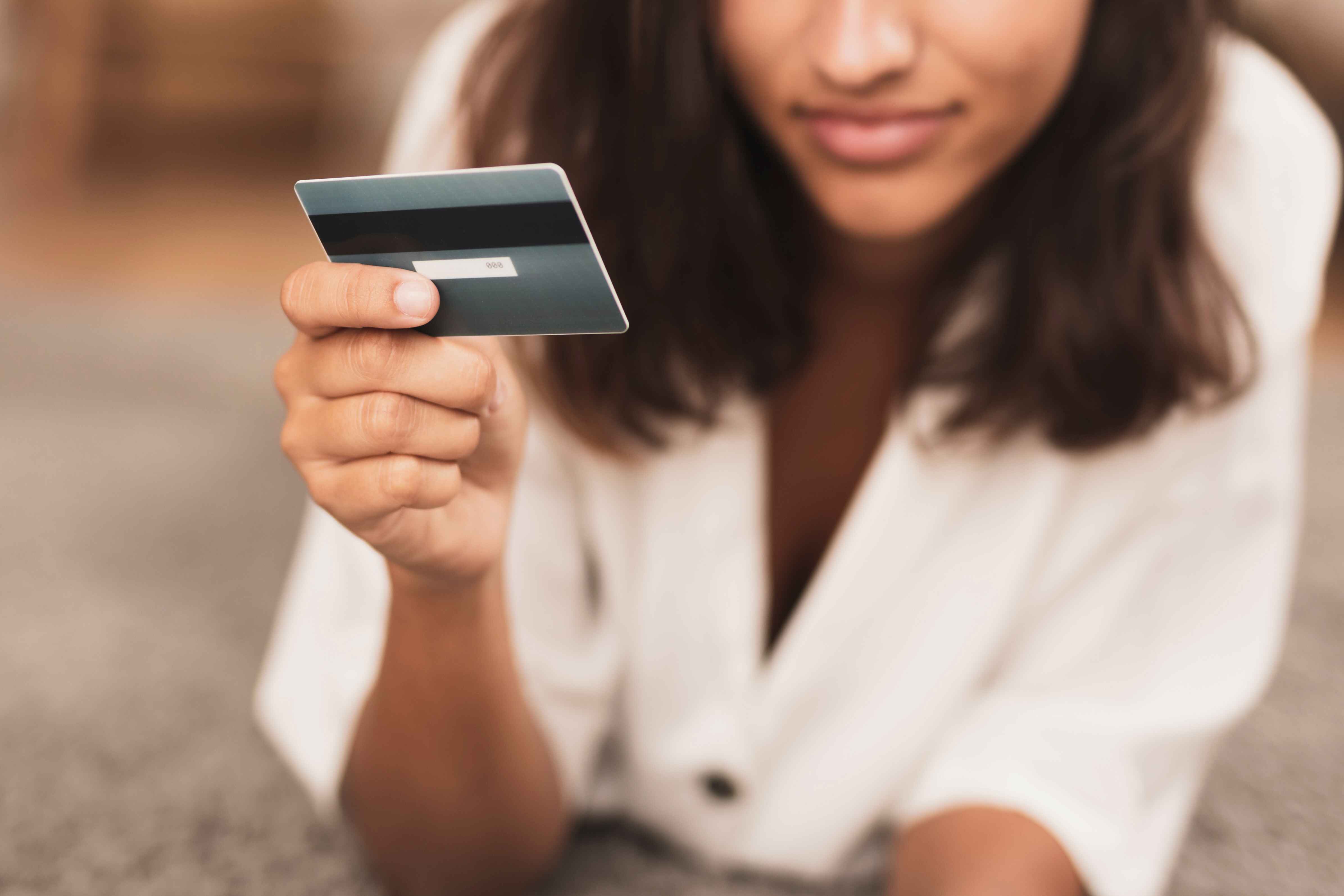 hand-holding-bank-card-close-up (1) Debt Consolidation in BC